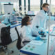 Modern Medicine Laboratory: Diverse Team of Multi-Ethnic Young Scientists Analysing Test Samples. Advanced Lab with High-Tech Equipment, Microbiology Researchers Design, Develop Drugs, Doing Research